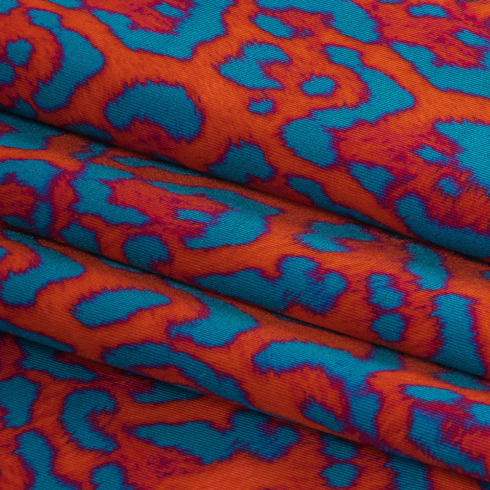 Compression Swimwear Tricot, UV Protective with Aloe Vera Microcapsules - Fjord Blue and Red Orange Leopard Spots - Caye Collection - Folded