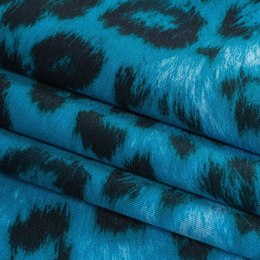 Compression Swimwear Tricot, UV Protective with Aloe Vera Microcapsules - Blue Cheetah Spots - Caye Collection - Folded