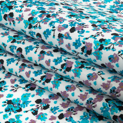 Turquoise, Lilac, and White Tiny Flowers Cotton Shirting Folded