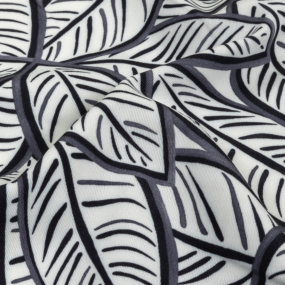 White, Folkstone Gray and Black Leaves UV Protective Compression Swimwear Tricot with Aloe Vera Microcapsules - Detail