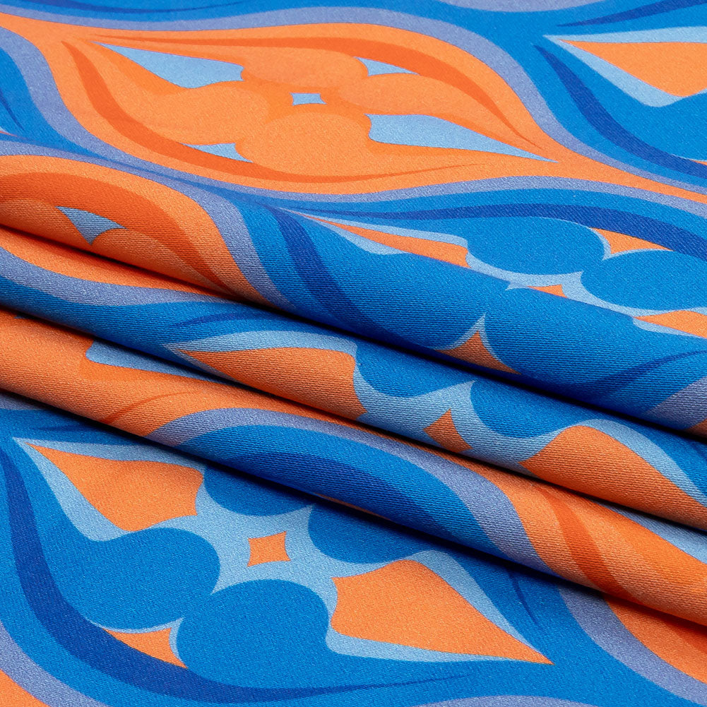 Stretch Cotton Sateen - Blue and Orange Ogees - Eye of the Storm Print - Mood Exclusive Groove Collection - Folded