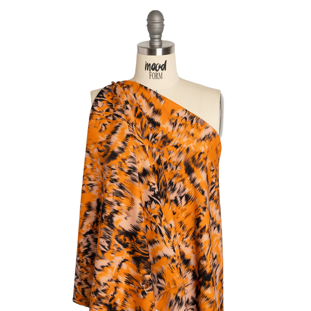 Stretch Polyester Woven Print - Orange and Black Abstract Ikat - Mood Exclusive Shifting Sands Drape