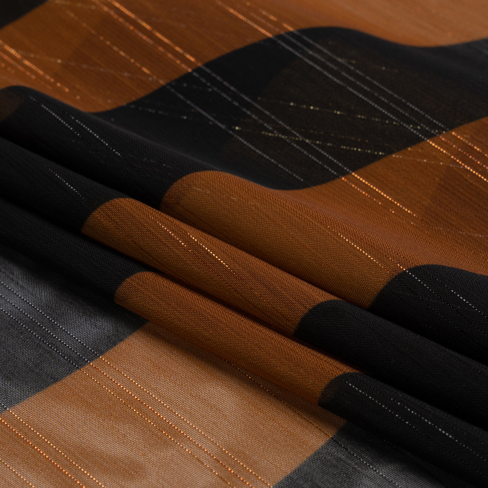 Polyester Chiffon Print with Metallic Pinstripes - Brown and Black Wavy Stripes - Mood Exclusive Delray Daze Folded