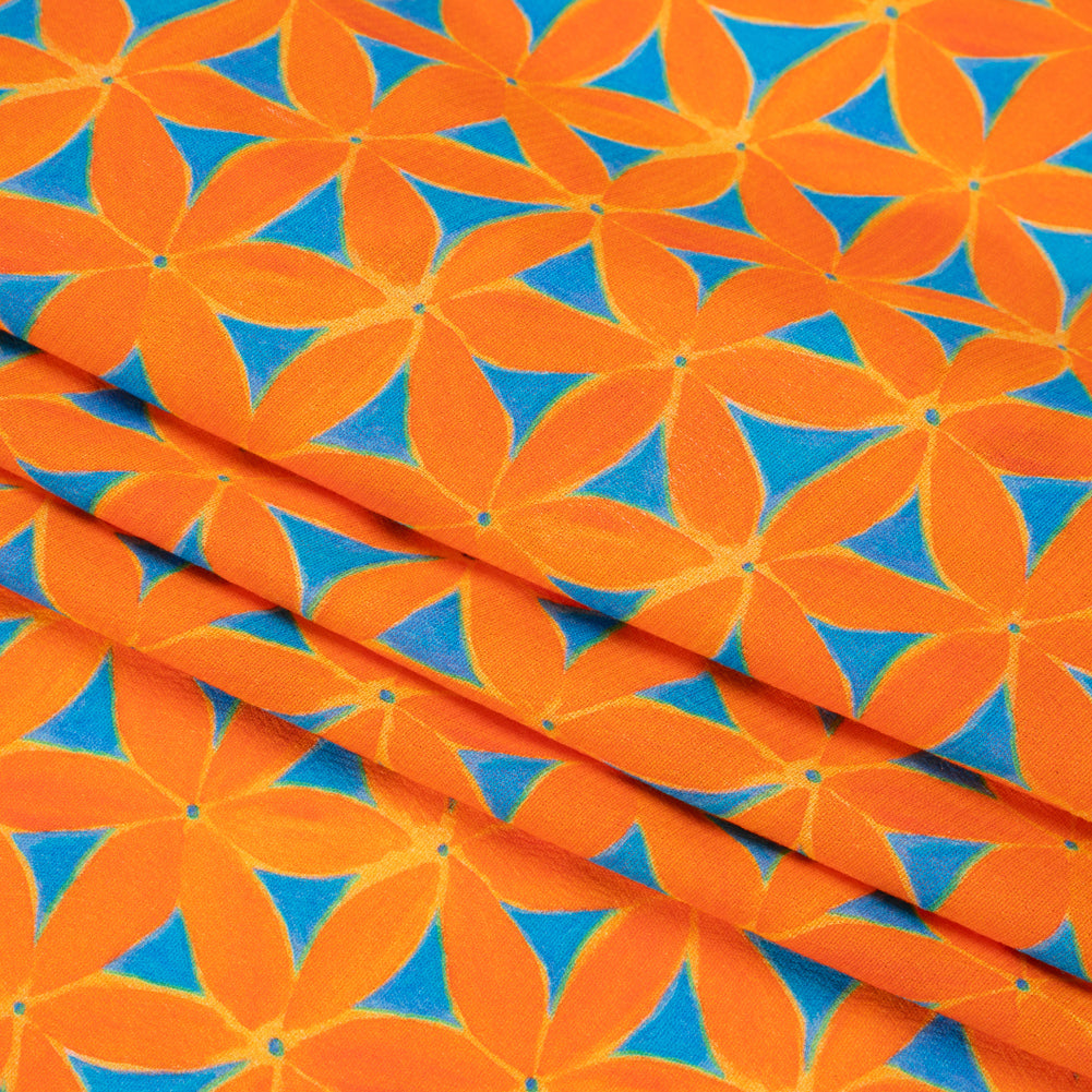 Sustainable Viscose Crepe Print - Orange and Teal Flower Lattice - Mood Exclusive Lovely Lillies Folded