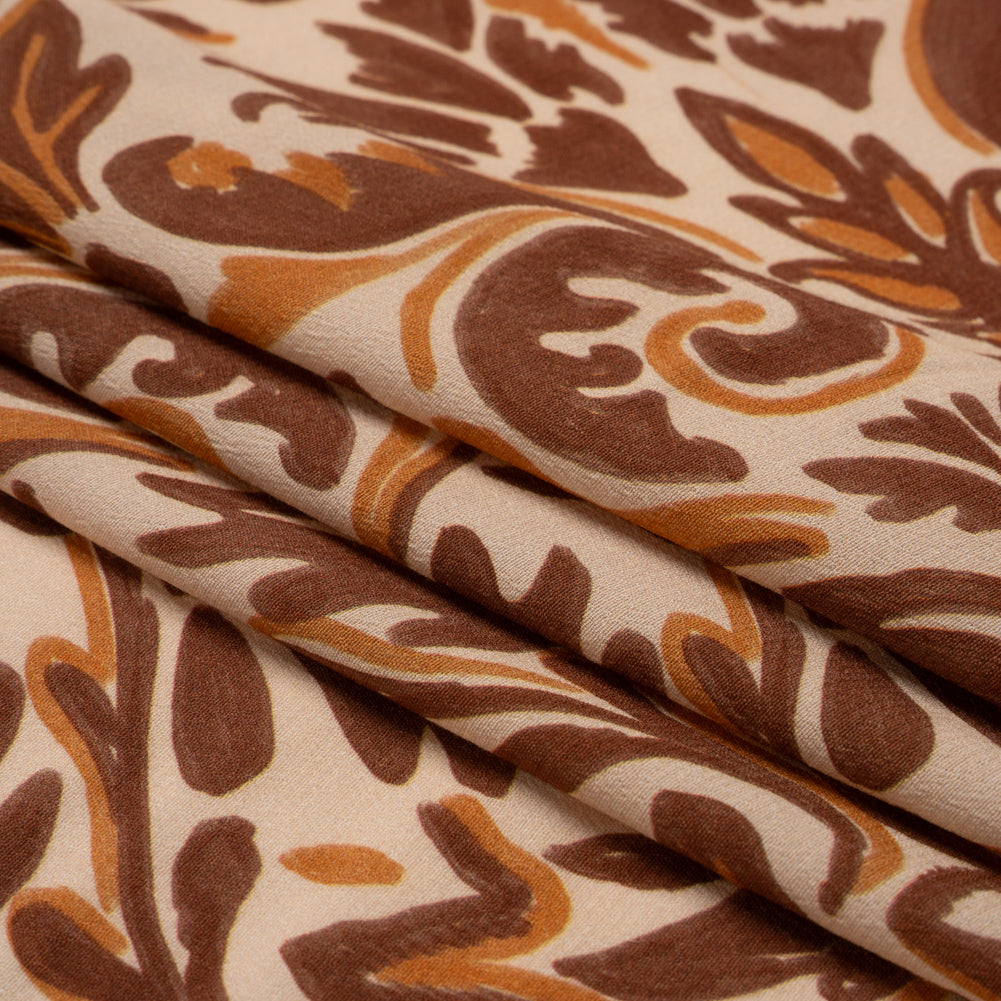 Sustainable Viscose Crepe Print - Beige, Burgundy and Orange Floral Damask - Mood Exclusive Pieces into Place Folded