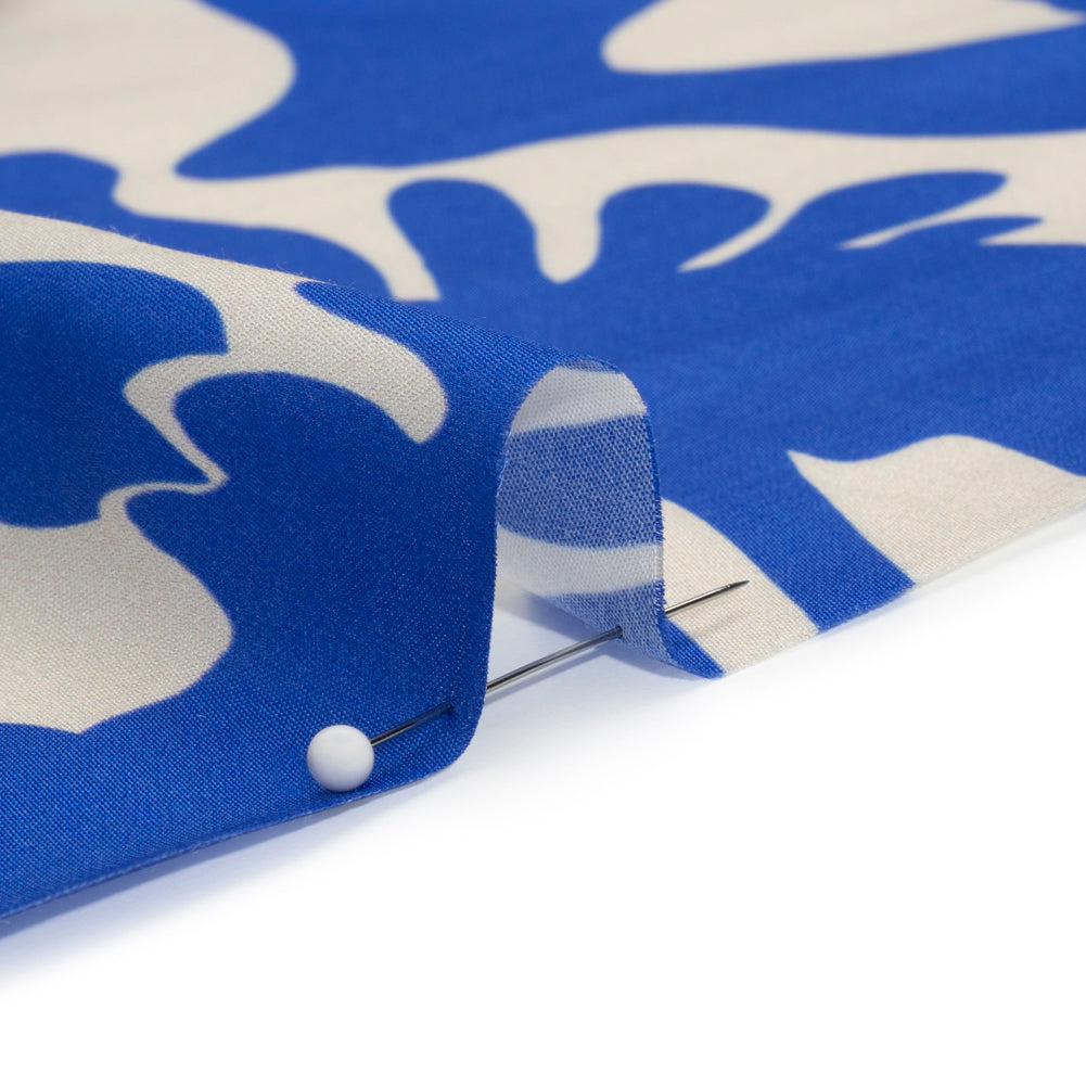 Sustainable and Recycled Viscose Satin Print - Blue and White Hands - Mood Exclusive Helping Hands Folded