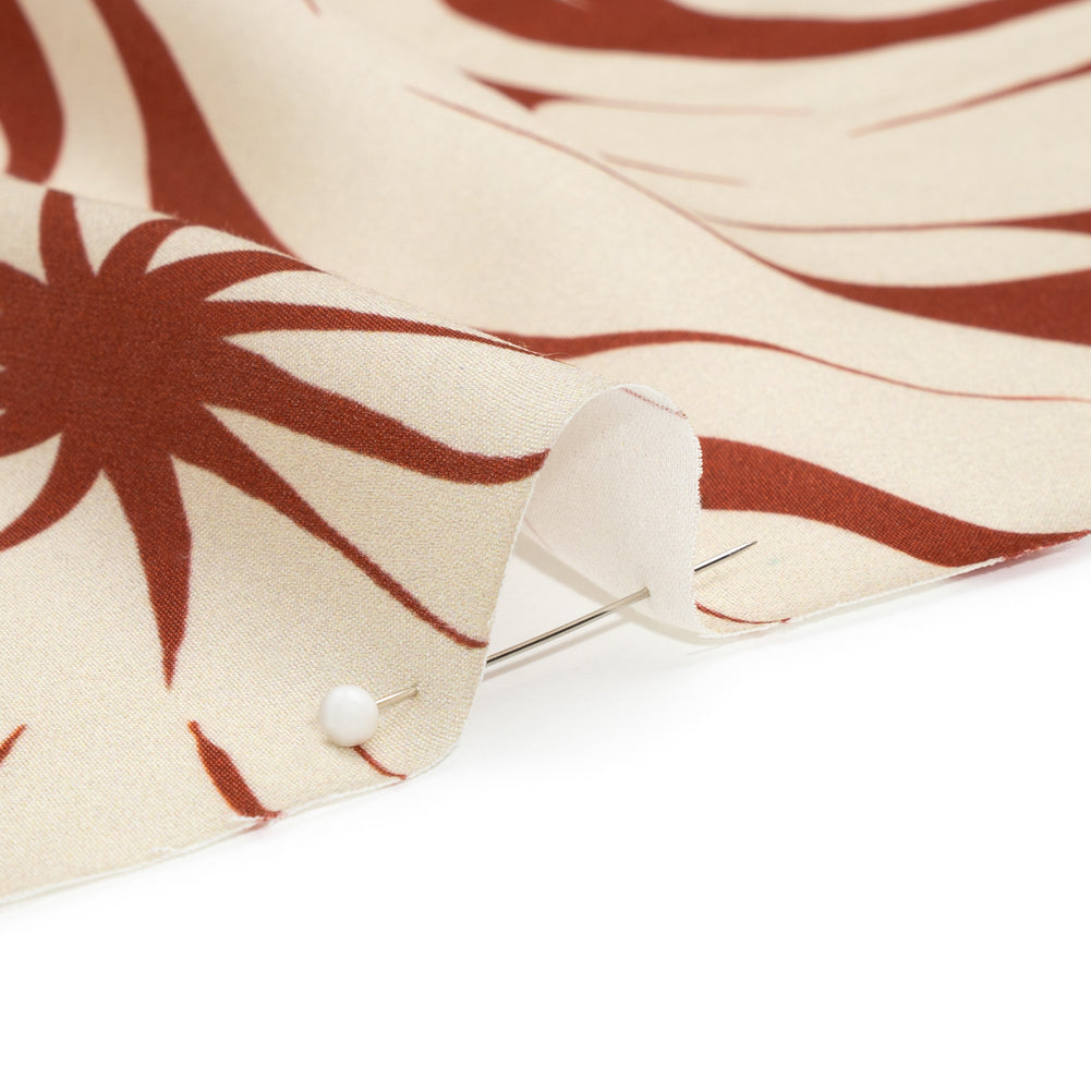 Sustainable and Recycled Viscose Satin Print - Red and Cream Swirls and Stars - Mood Exclusive Vincent's Hope Folded