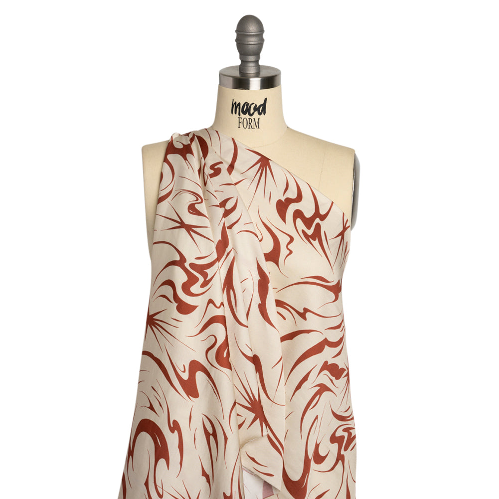 Sustainable and Recycled Viscose Satin Print - Red and Cream Swirls and Stars - Mood Exclusive Vincent's Hope Detail