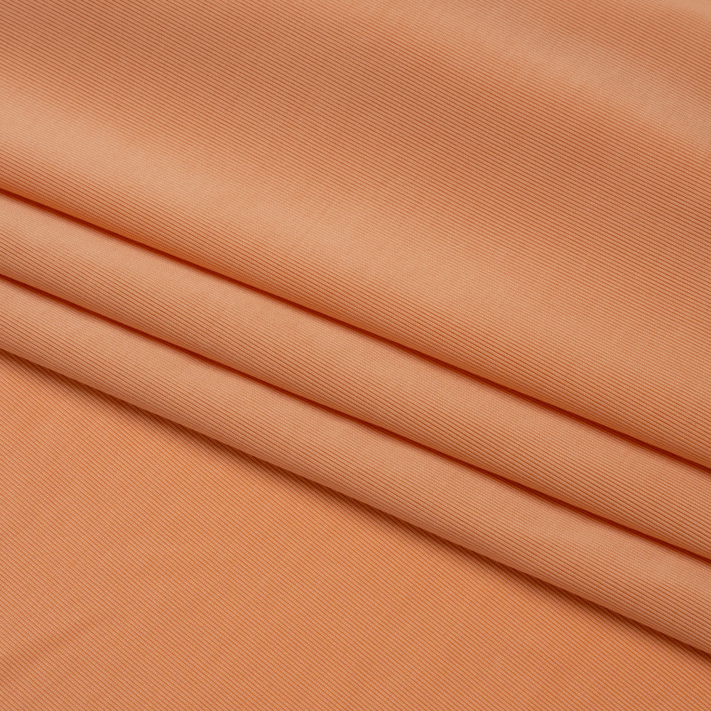 Famous Australian Designer Peach Stretch Polyester Jersey Folded