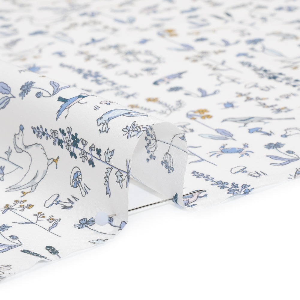 Liberty Fabrics Tana Lawn® - Theo Blue - Baby Blue, Yellow and White Cartoon Creatures and Flowers - Detail