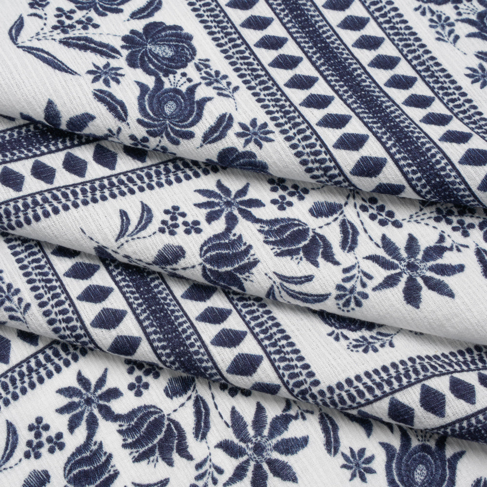 Slubbed Gauzy Cotton Woven - White and Navy Blue Floral Embroidery Squares - Mood Exclusive Porcelain Petals Print - Folded