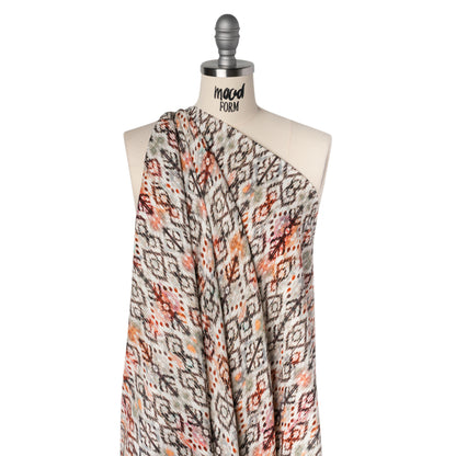 Slubbed Gauzy Cotton Woven - Red, Orange and Dark Green Geometric Ikat - Mood Exclusive Secret Symbols Print