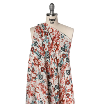 Slubbed Gauzy Cotton Woven - Coral Red, Dark Blue and Light Gray Ikat Leaves and Swirls - Mood Exclusive Fanciful Fairy Print