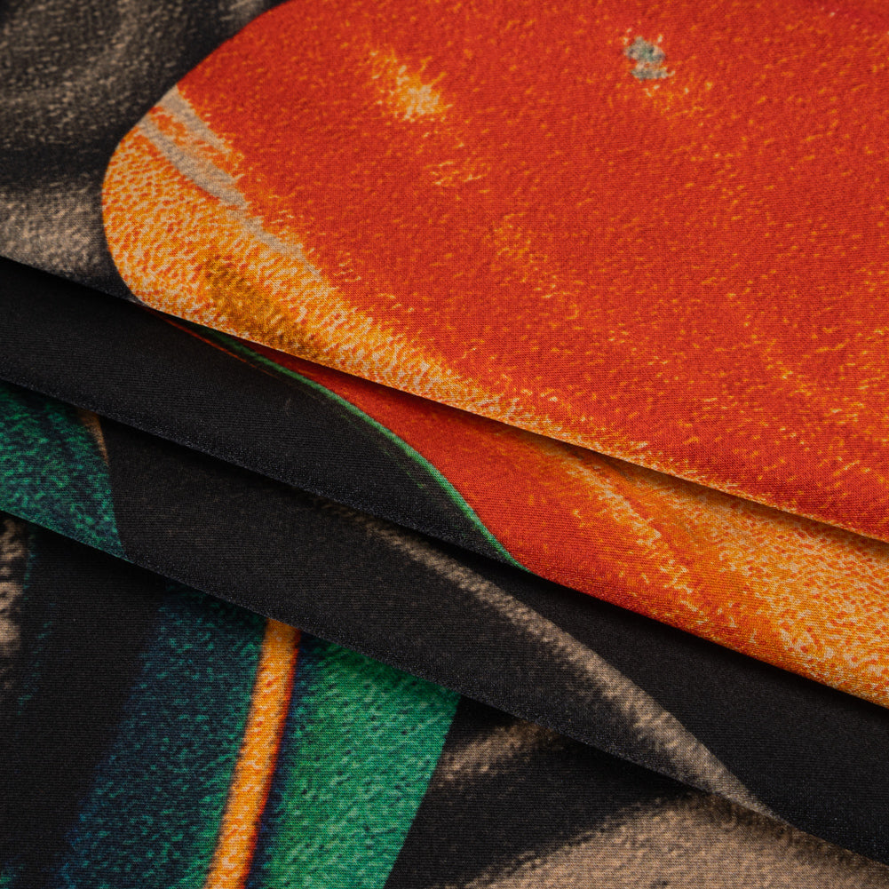 Stretch Silk Charmeuse Print - Black, Green and Orange Celestial Swooshes - Deadstock - Folded