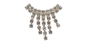 A close up of a necklace with a bunch of crystals on it