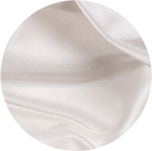 A close up of a white cloth with a circular shape