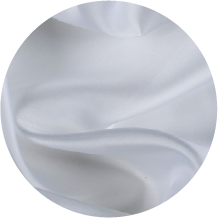 A close up of a white fabric with a circular shape