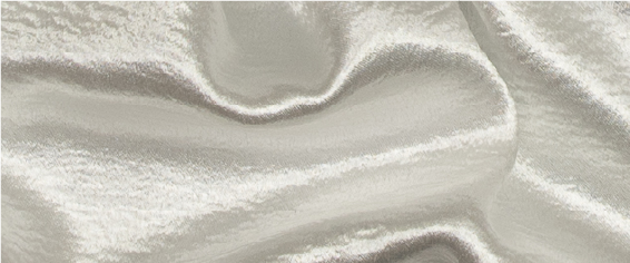 A close up of a white fabric with a very large amount of folds
