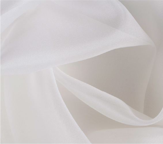 A close up of a white fabric with a white background