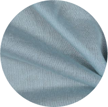 A close up of a blue cloth with a circular shape