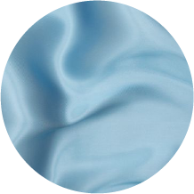 A close up of a blue fabric with a circular shape