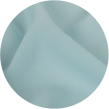 A close up of a blue fabric with a white background