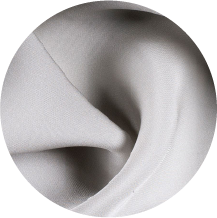 A close up of a white cloth with a circular shape