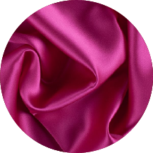 A pink fabric is shown in a circle