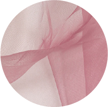 A close up of a pink and white fabric in a circle