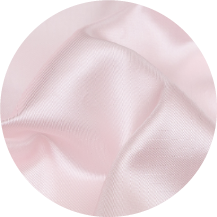 A close up of a pink fabric with a white background