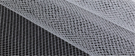 A close up of a piece of white mesh fabric
