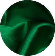 A close up of a green fabric with a white background