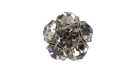 A close up of a diamond ring on a white surface