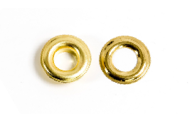 Two gold colored metal rings on a white surface