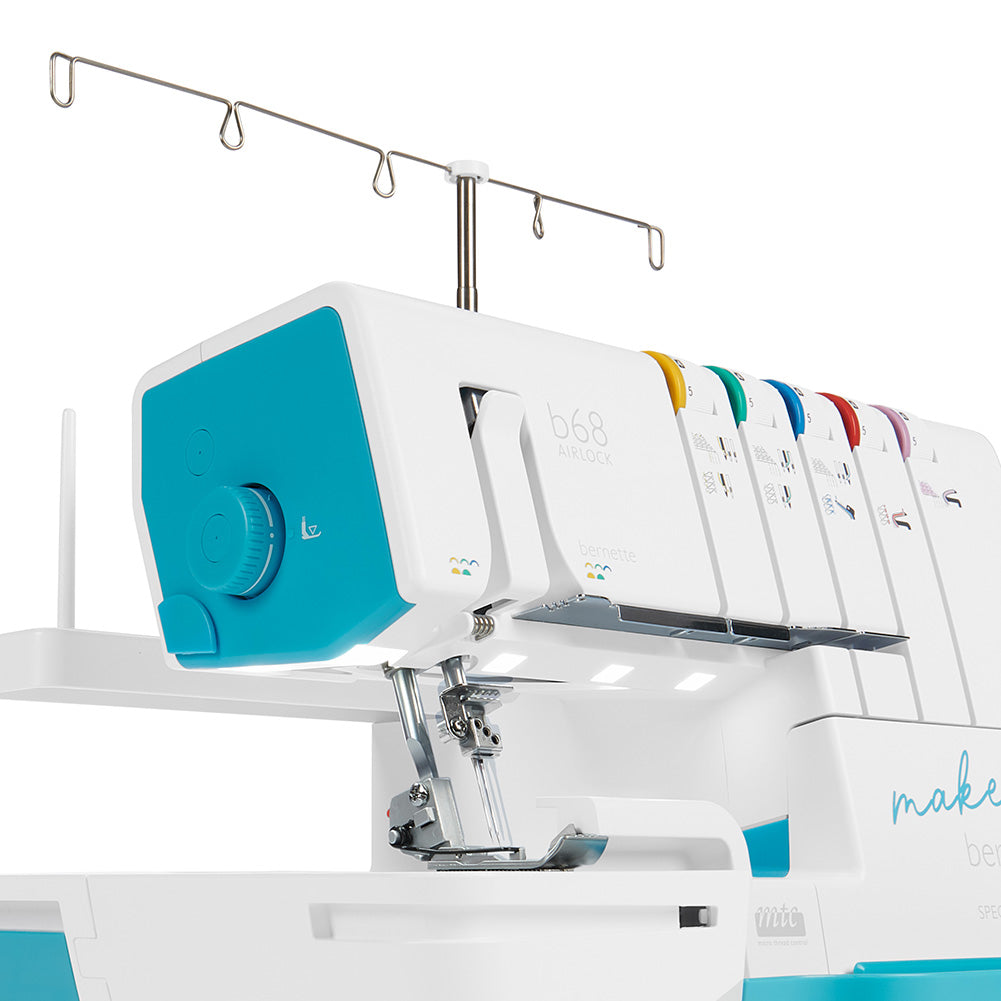 bernette 68 Maker Edition - Air-Threading Combination Overlock, Chainstitch and Coverstitch Serger Sewing Machine with Presser Foot Set and Mini Vacuum Cleaner - Detail