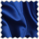 A close up of a blue fabric with a scallop edge