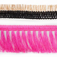 A close up of a pair of pink and black fringes