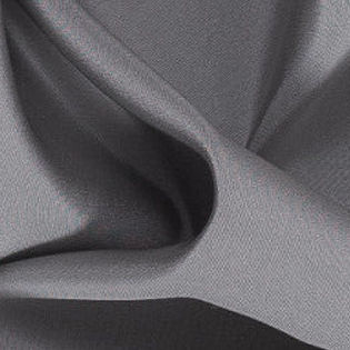 A close up of a plain grey fabric with a slight pattern
