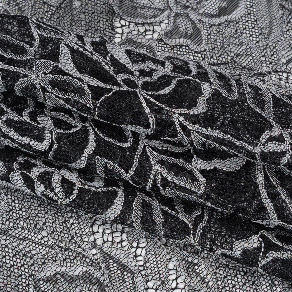 Corded Lace with Finished Edge - White on Black Sweeping Roses - Folded