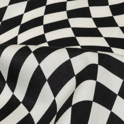 Stretch Cotton Sateen - Black and White Warped Checks - Down the Rabbit Hole Print - Mood Exclusive Indigo Collection
