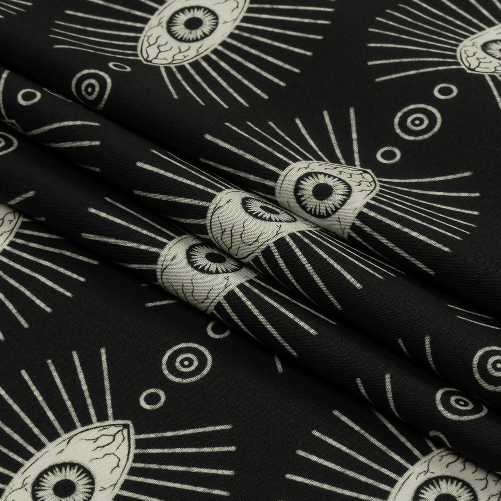 Stretch Cotton Poplin - Black and WhiteLines of Eyes - Tell Tale Print - Mood Exclusive Nevermore Collection - Folded