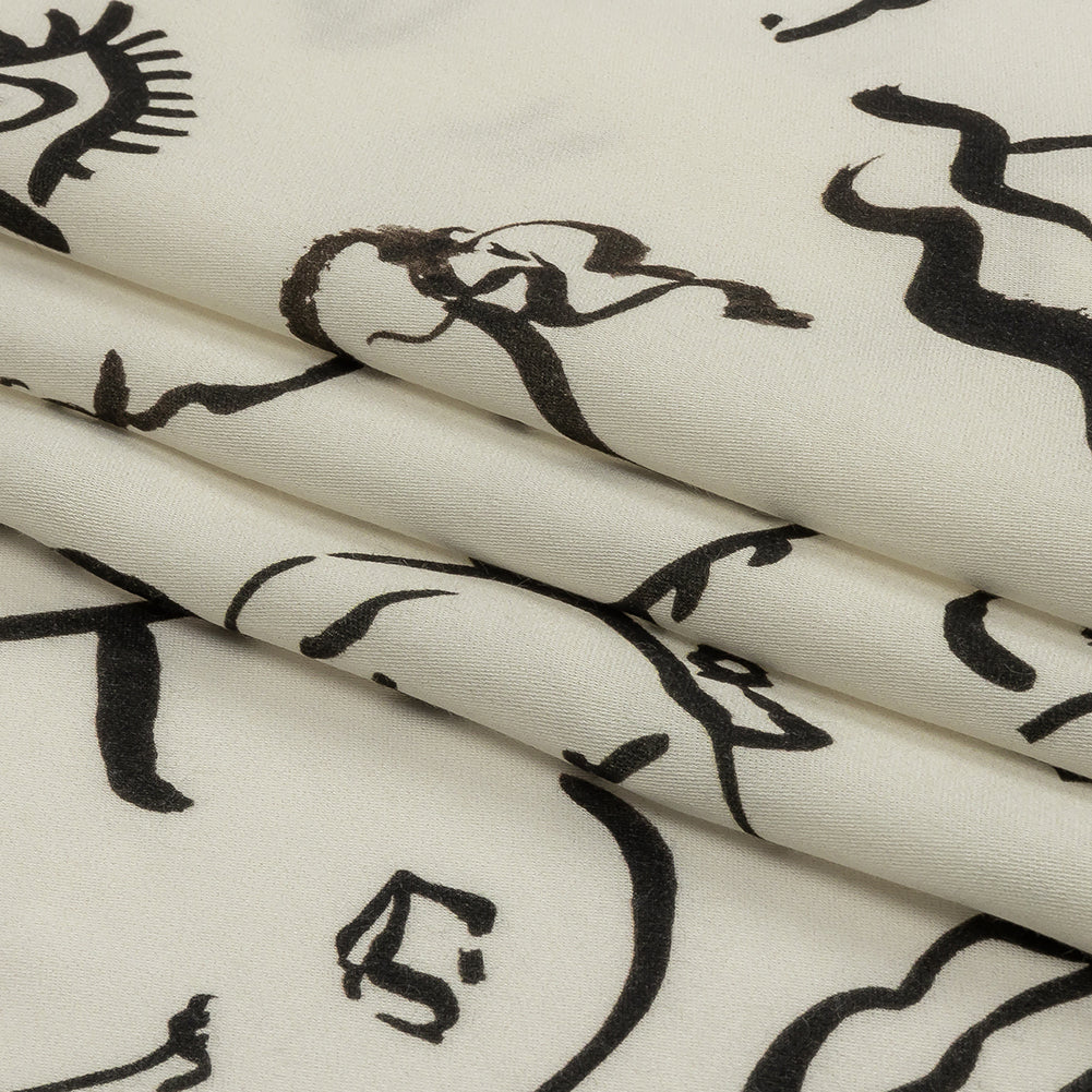 Rayon Challis - Black and White Face Drawings - Everyday Runway Print - Mood Exclusive Metro Collection - Folded