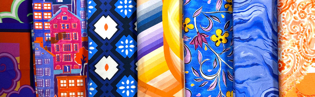 A close up of a bunch of ties hanging on a wall