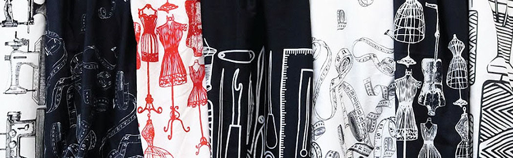 A close up of a rack of ties with different designs