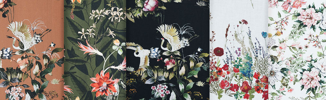 A close up of a bunch of different colored floral fabrics