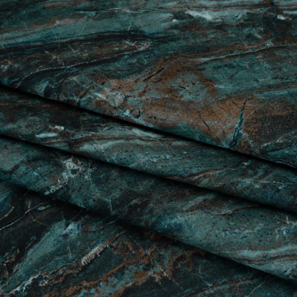 Stonehenge Quilting Cotton by Northcott - Prussian Marble 5 Stone Swirl - Surfaces Collection - Folded