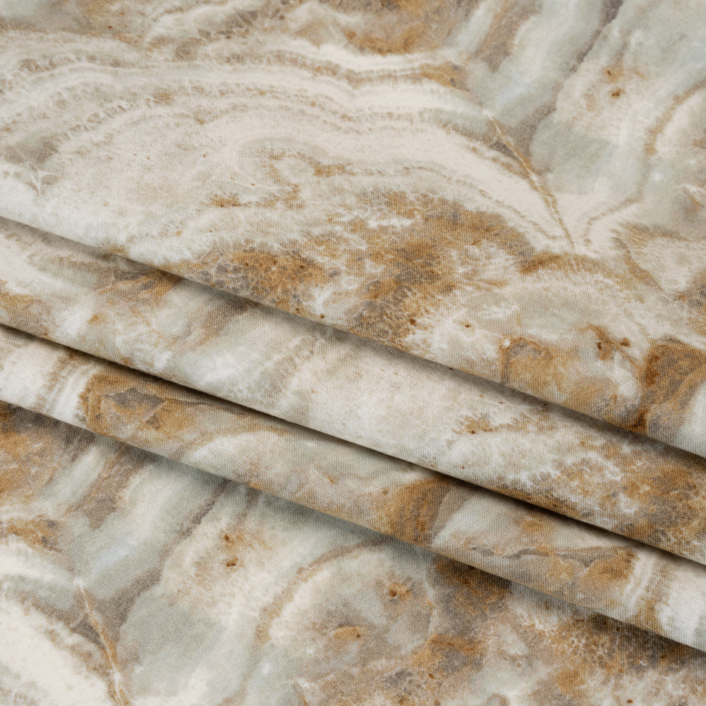 Stonehenge Quilting Cotton by Northcott - Cream Marble 8 Swirling Stone - Surfaces Collection - Folded