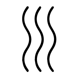 A man that is standing in the dark with a cell phone