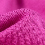 A close up of a pink fabric with a very thin pattern