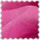 A close up of a pink fabric with a scallop edge